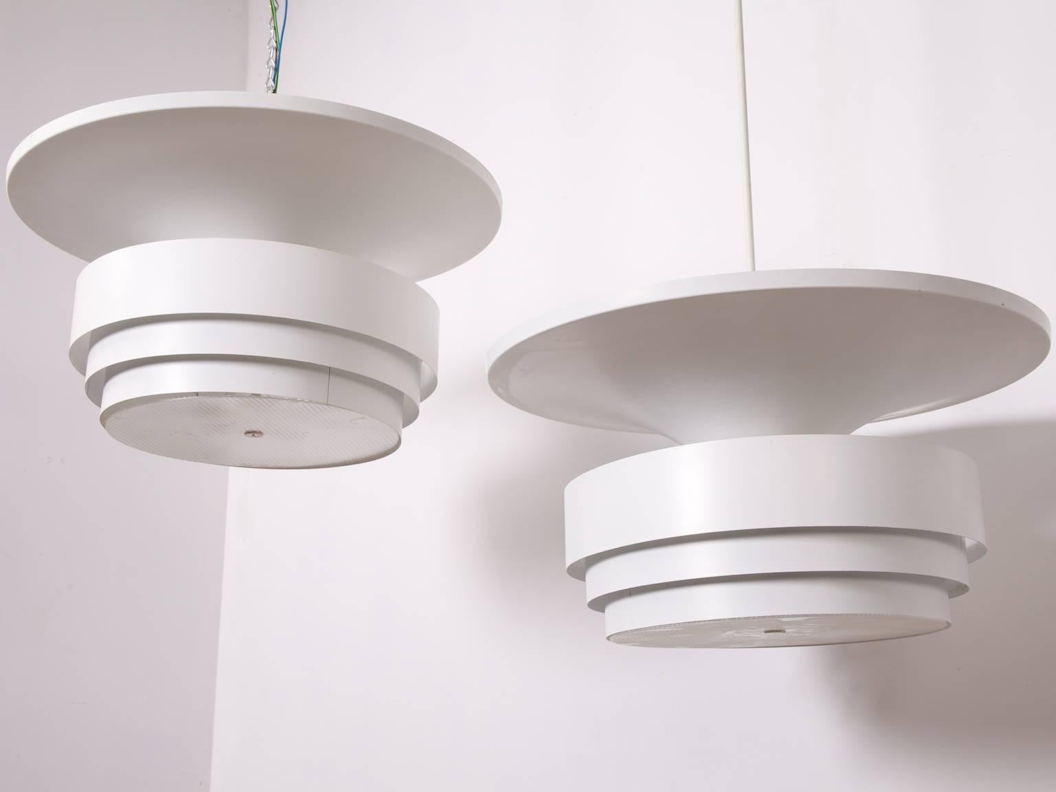 A run of six multi layered pendant lights designed by Hans Agne Jakobssen,

Danish, 1960s.

Rewired and pat tested.

.