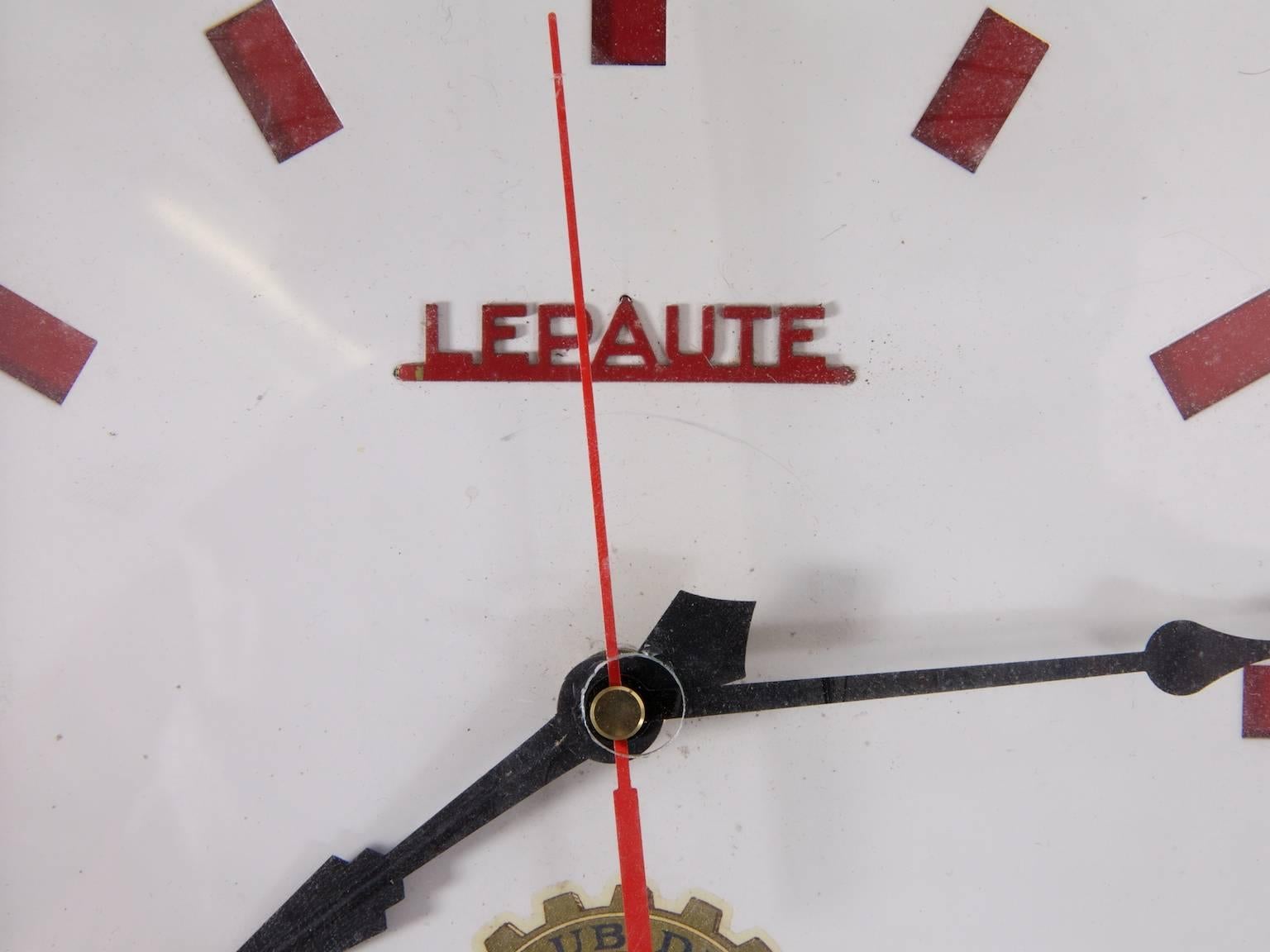 A steel cased wall clock produced by Lepaute for the Vespa club of France.

French late 1950s-early 1960s.

Fully working order. 

