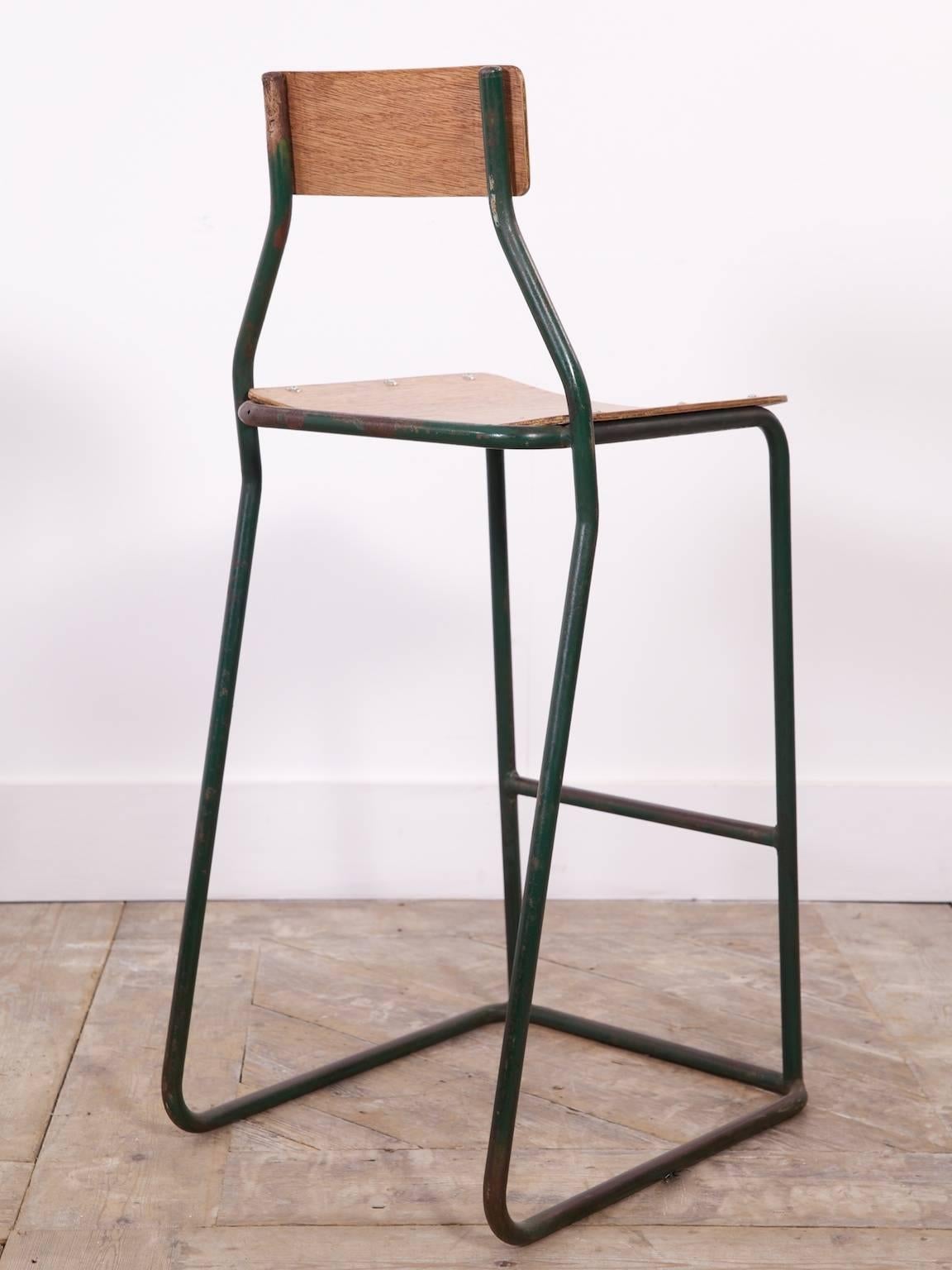 Tall Mid-Century tubular steel and steamed ply stacking chairs.

Ideal bar or counter size, three available, priced and sold individually.
 