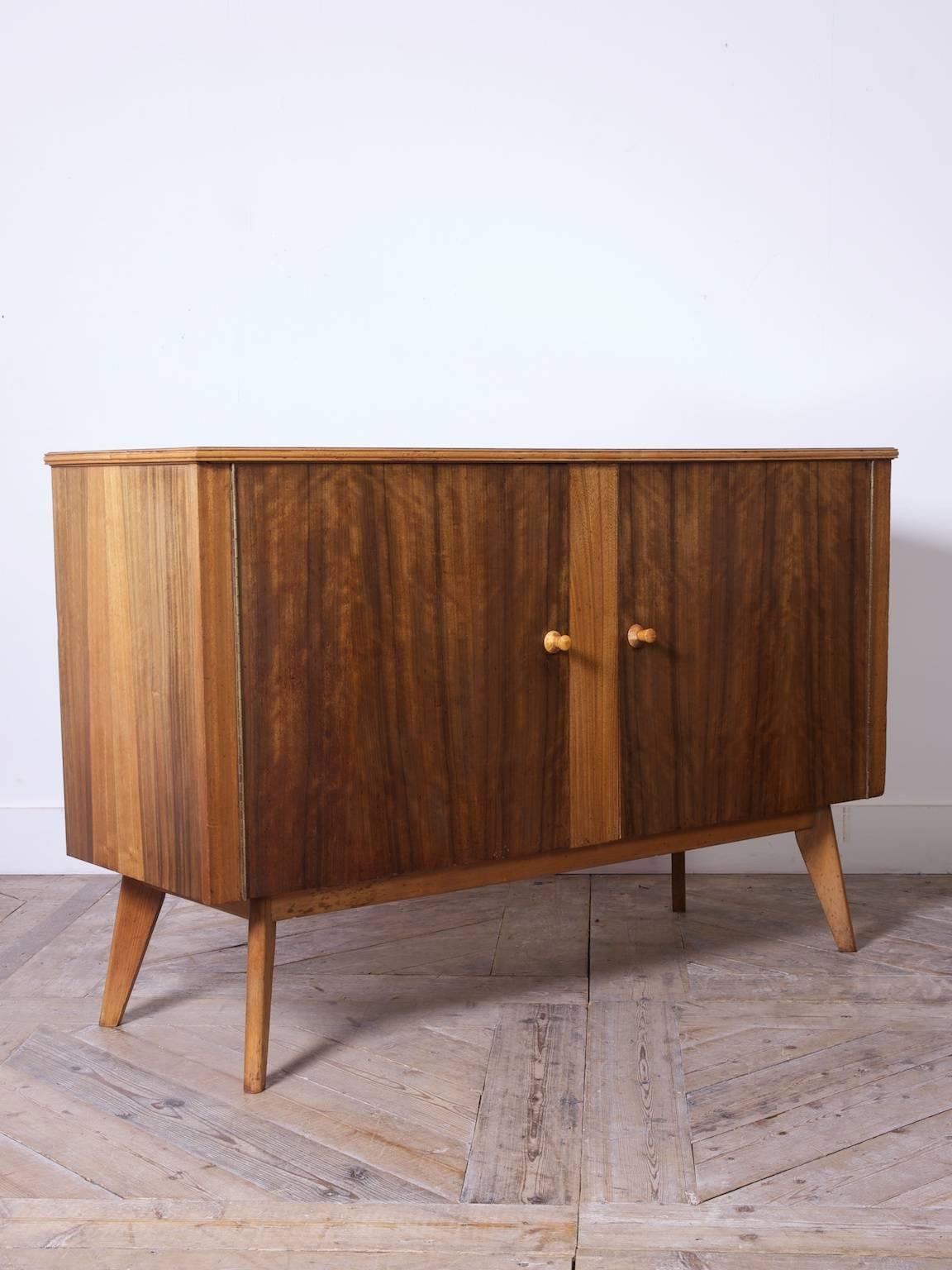 A walnut sideboard by Morris of Glasgow,

Scottish, 1957.
         