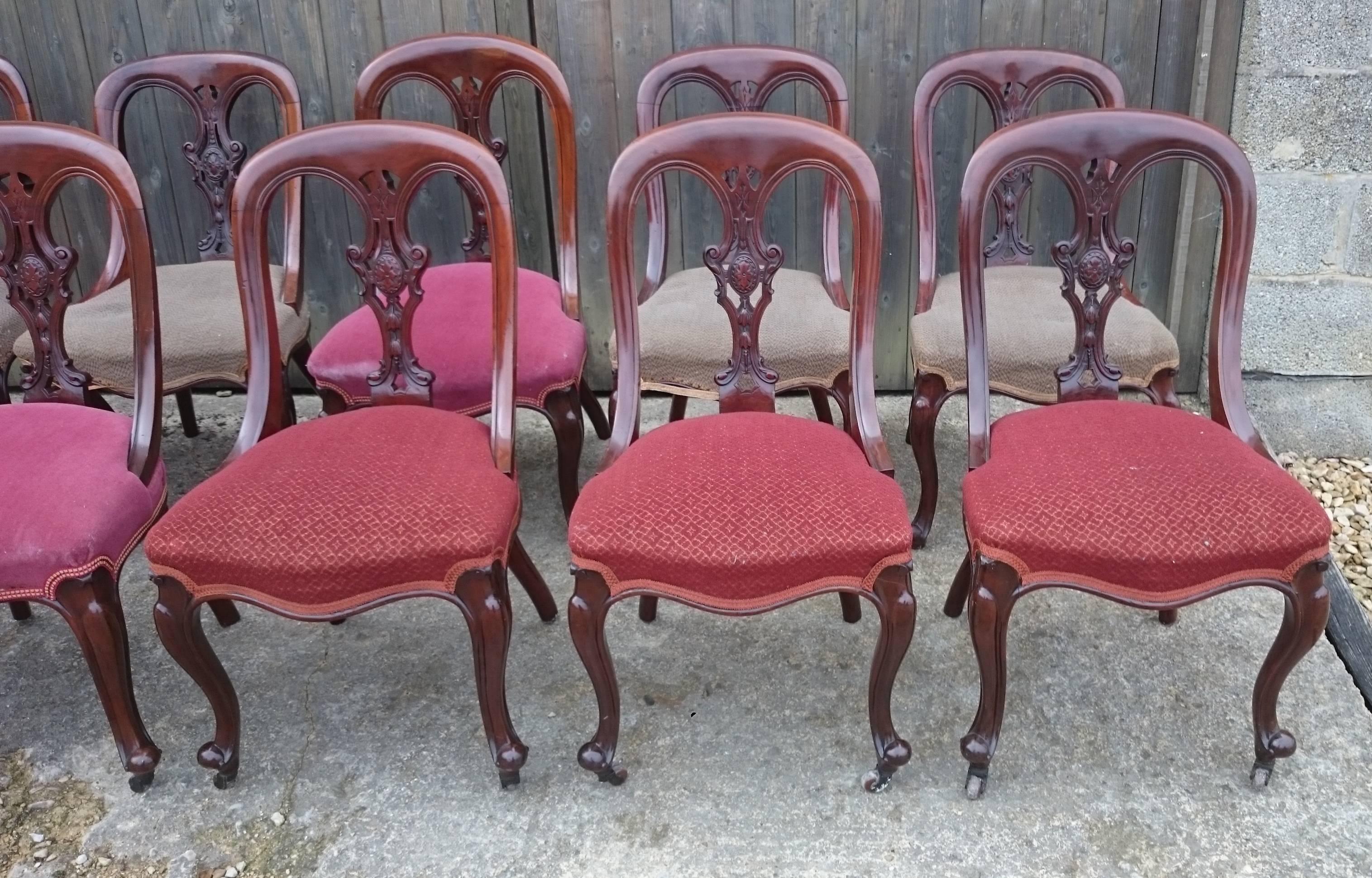 Set of ten Victorian mahogany aesthetic movement dining chairs, these chairs could well be made of dense grained solid walnut rather than mahogany, it is hard to tell. These chairs are a very generous shape and are comfortable as a result. The back