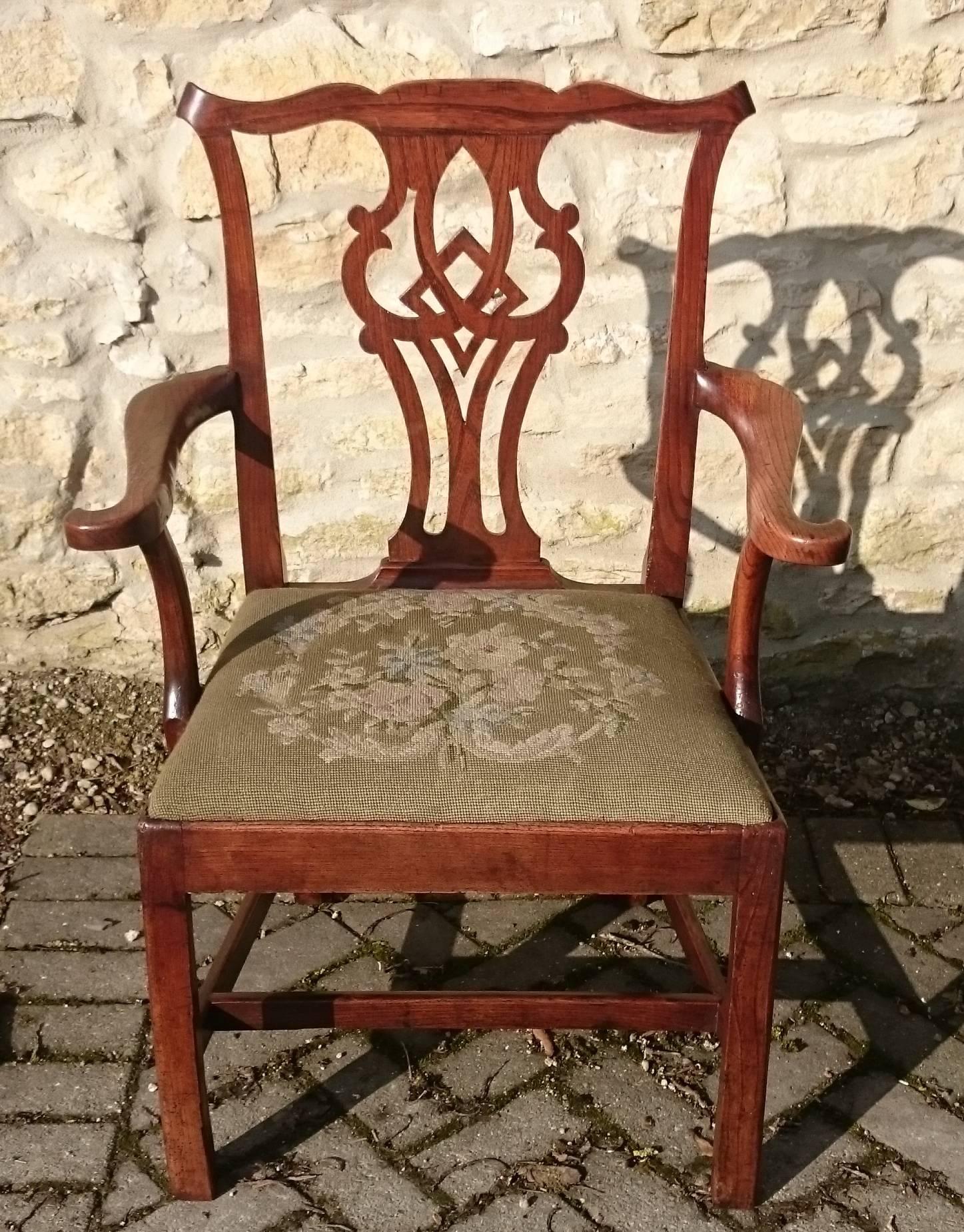 George III period 18th century antique elm armchair with drop in seat in old flat-weave fabric. This is a charming armchair made of sought after indigenous elmwood which has faded to a desirable color with a good deep patina. The pierced back splat