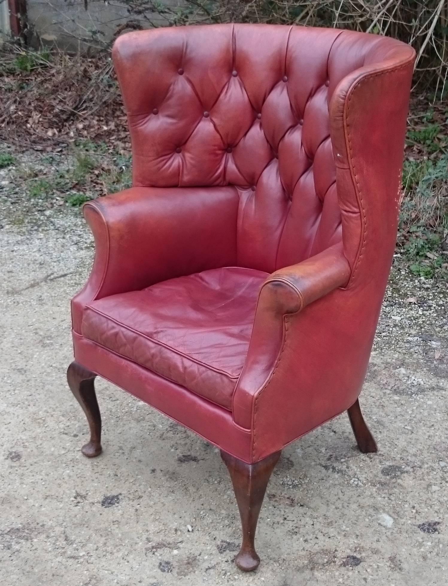 Edwardian Button Back Barrel Back Leather Wing Chair by Howard and Sons of London