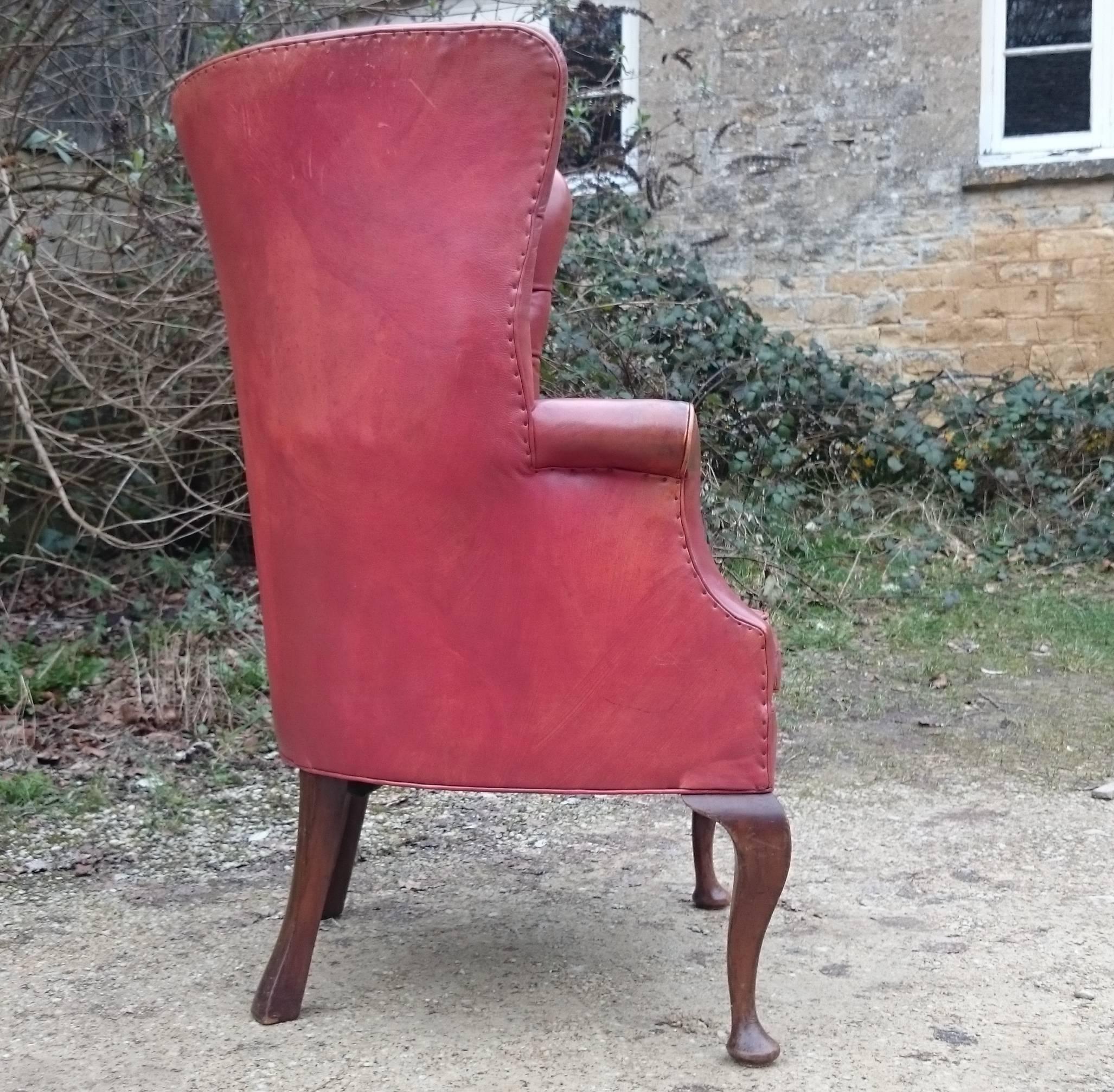 20th Century Button Back Barrel Back Leather Wing Chair by Howard and Sons of London