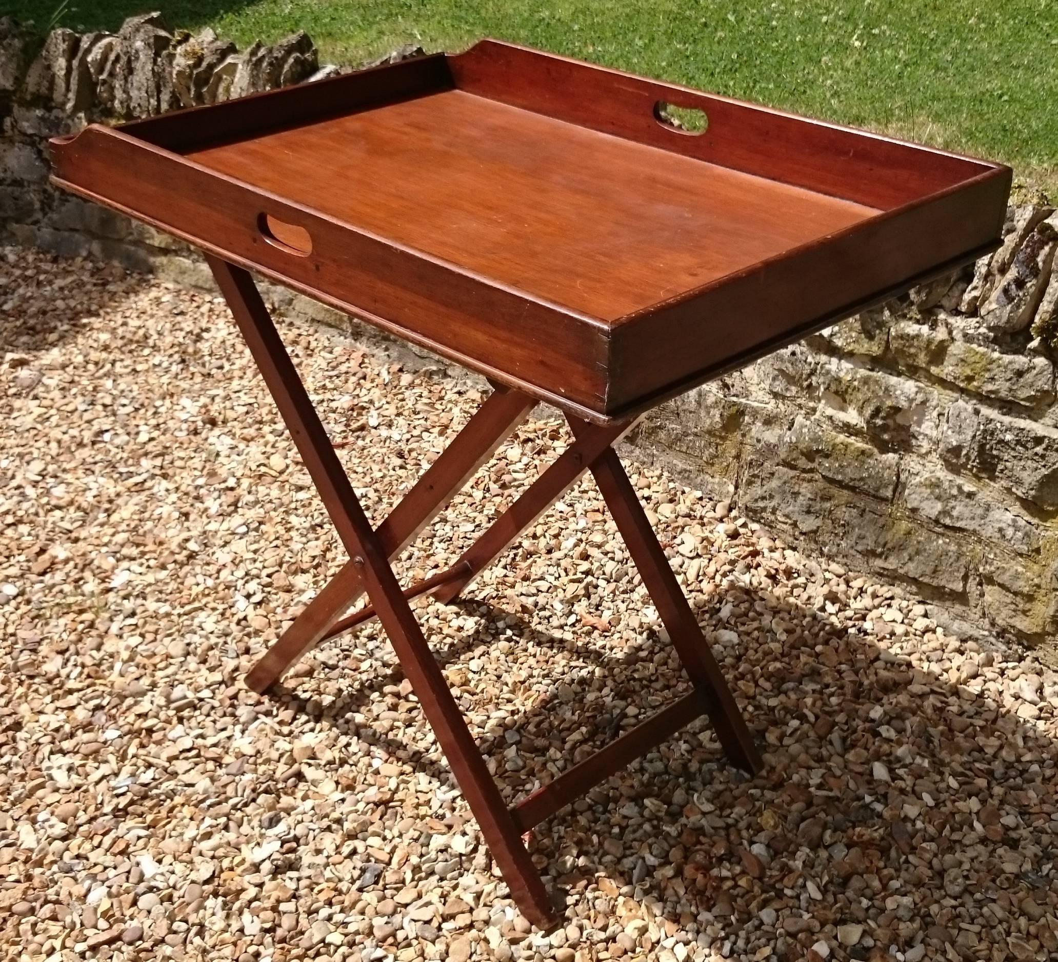 18th century George III mahogany folding butlers tray. This tray is well made as would be expected from the period, with good dovetails visible at the corners. It is a good large-scale too, with lots of space for tea or booze. Impress and amaze your