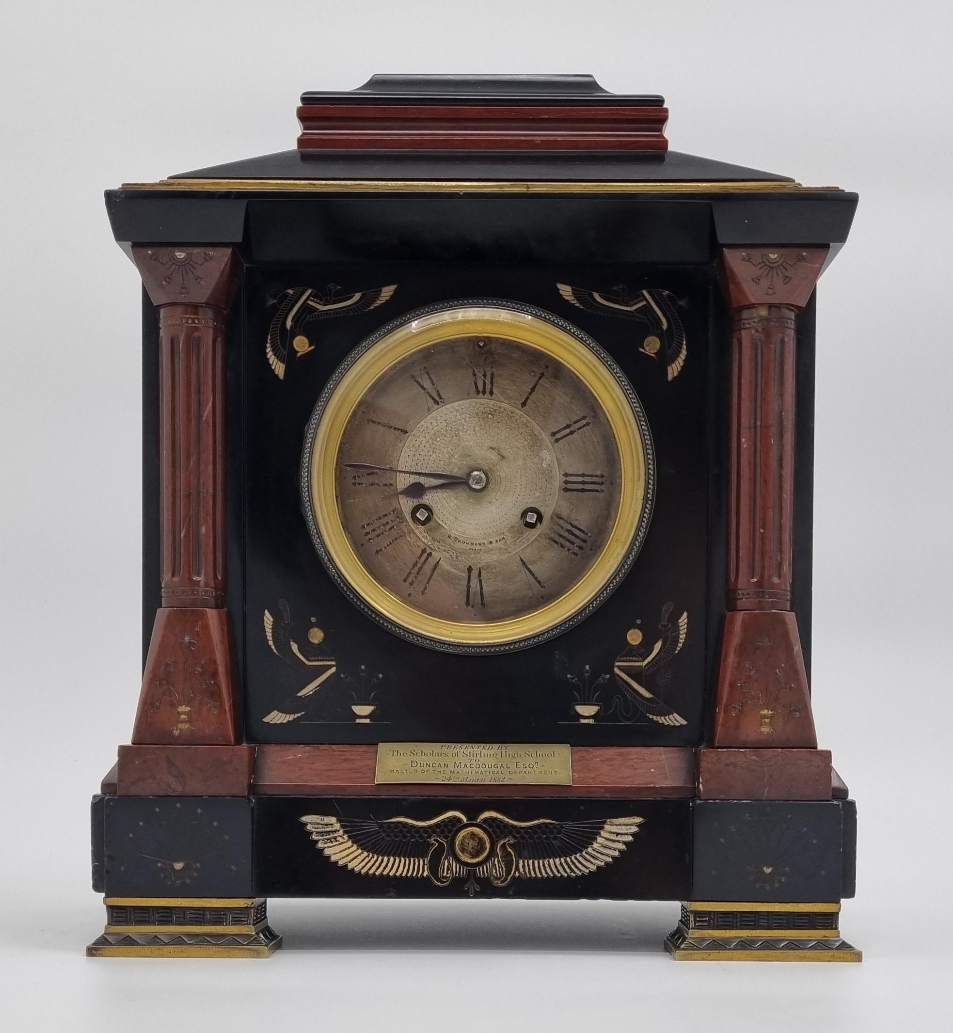 A highly unusual 19th Century Egyptian Revival Mantel Clock. Wonderful design architectural clock case with pagoda top, made of high quality red marble and black slate, all exquisitely decorated with bronze mouldings and hieroglyphics depicting