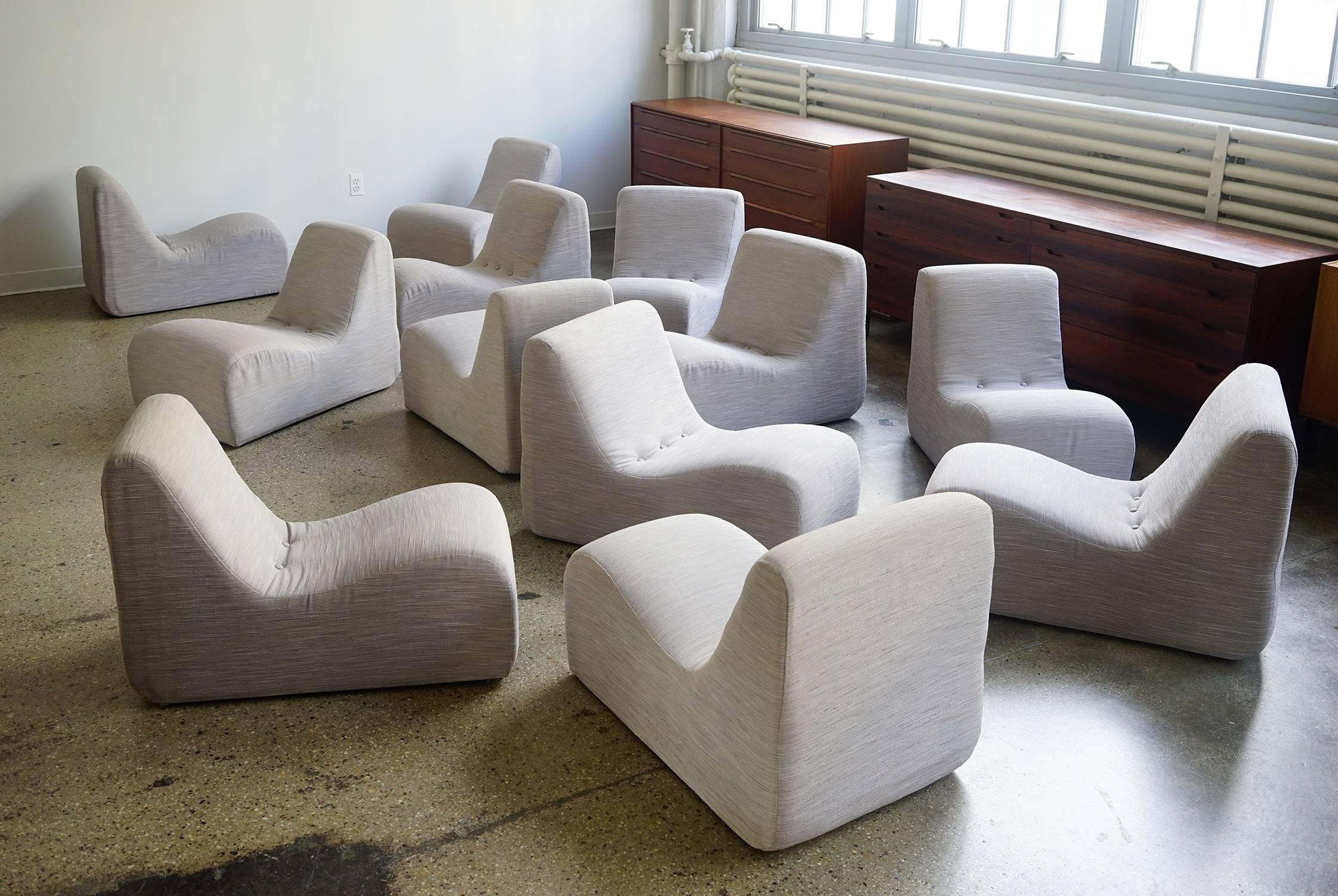 Exceptional 12-piece set comprised of seven inward-turning seats, three outward-turning seats, and two straight seats. Similar seats create a soft curve when sequenced together. Outward turning seats can be alternated with inward-turning seats to