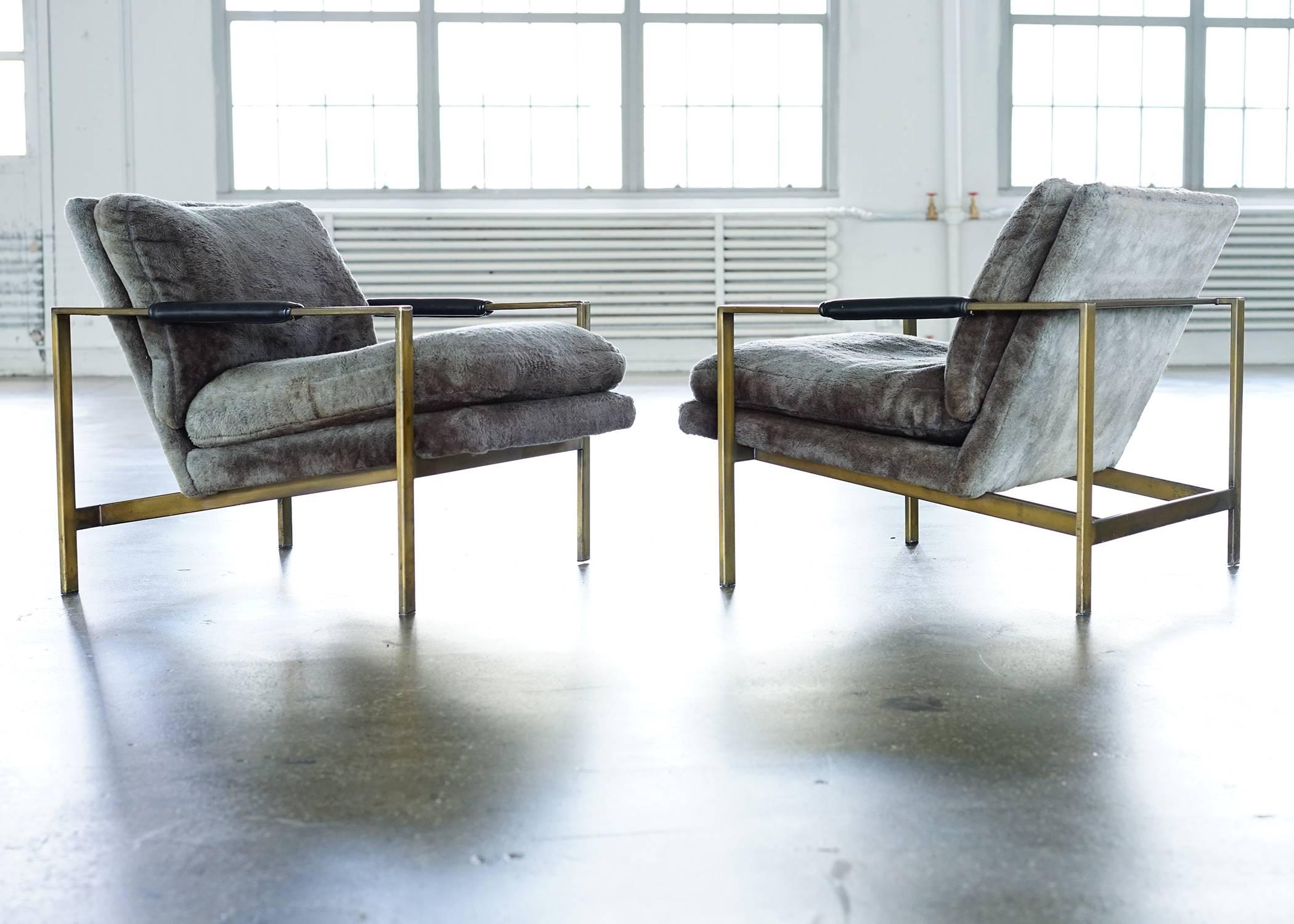 Early production model 951-103 with most desirable bronze finish on steel flat bar frame. Original gray faux fur upholstery and black vinyl upholstered arms. A Fine pair manufactured by Thayer Coggin in High Point, North Carolina.