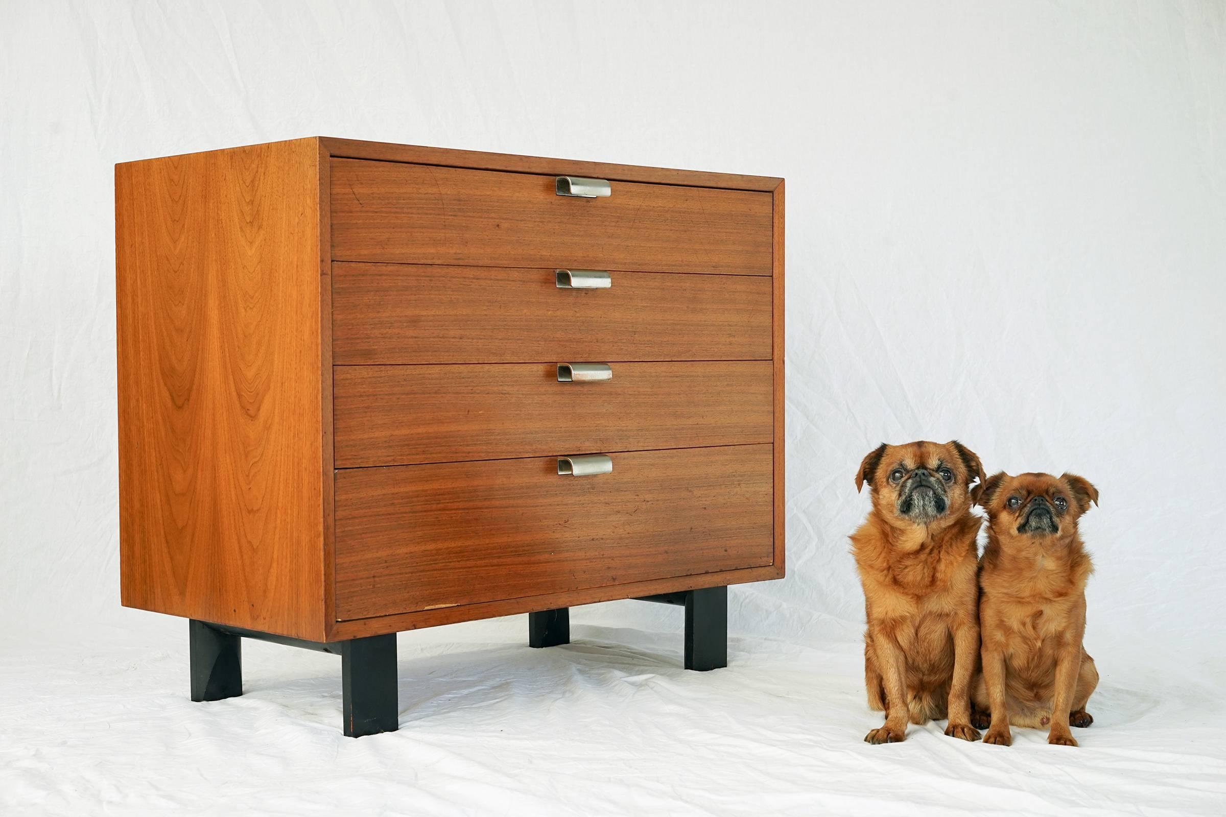 Handsome little four-drawer dresser featuring original finish with lovely natural patina and rich, warm tone. The top drawer features the rare, optional flip-open vanity mirror. With its 30