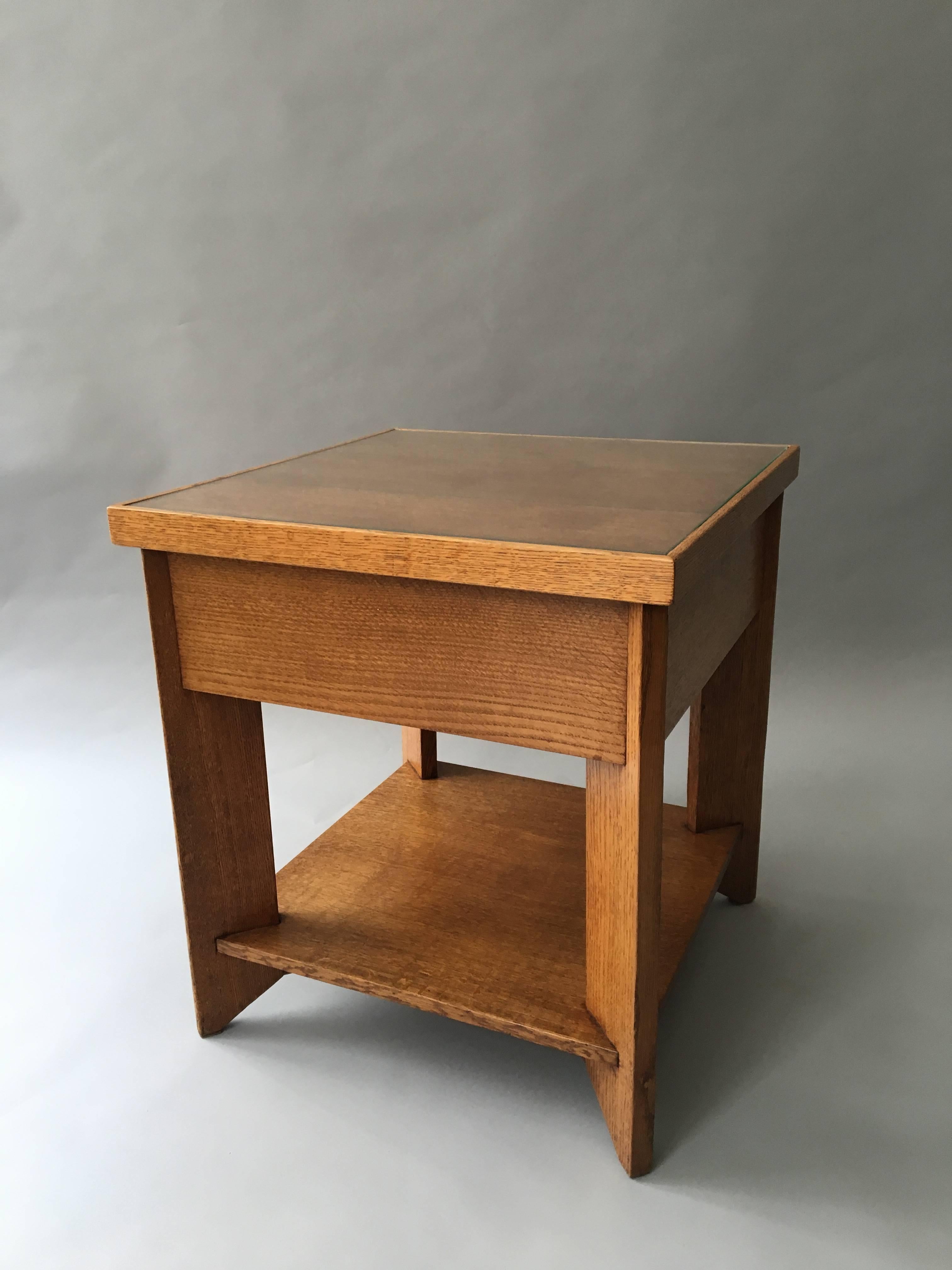 Designer: Hendrik Wouda.
Manufacturers: Pander & Son.
Well proportion low table in oak with a glass insert on top. The table was originally made in 1924. Hendrik Wouda was one of the most well known architect/Designers from The Hague School in