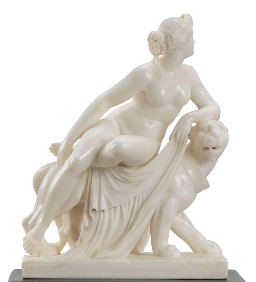 A spectacular Italian 19th century alabaster and marble statue of Greek goddess Ariadne seated on her panther. The green marble pedestal has a hexagonal shaped support with circular base and fluted Corinthian column.

In Greek mythology, Ariadne