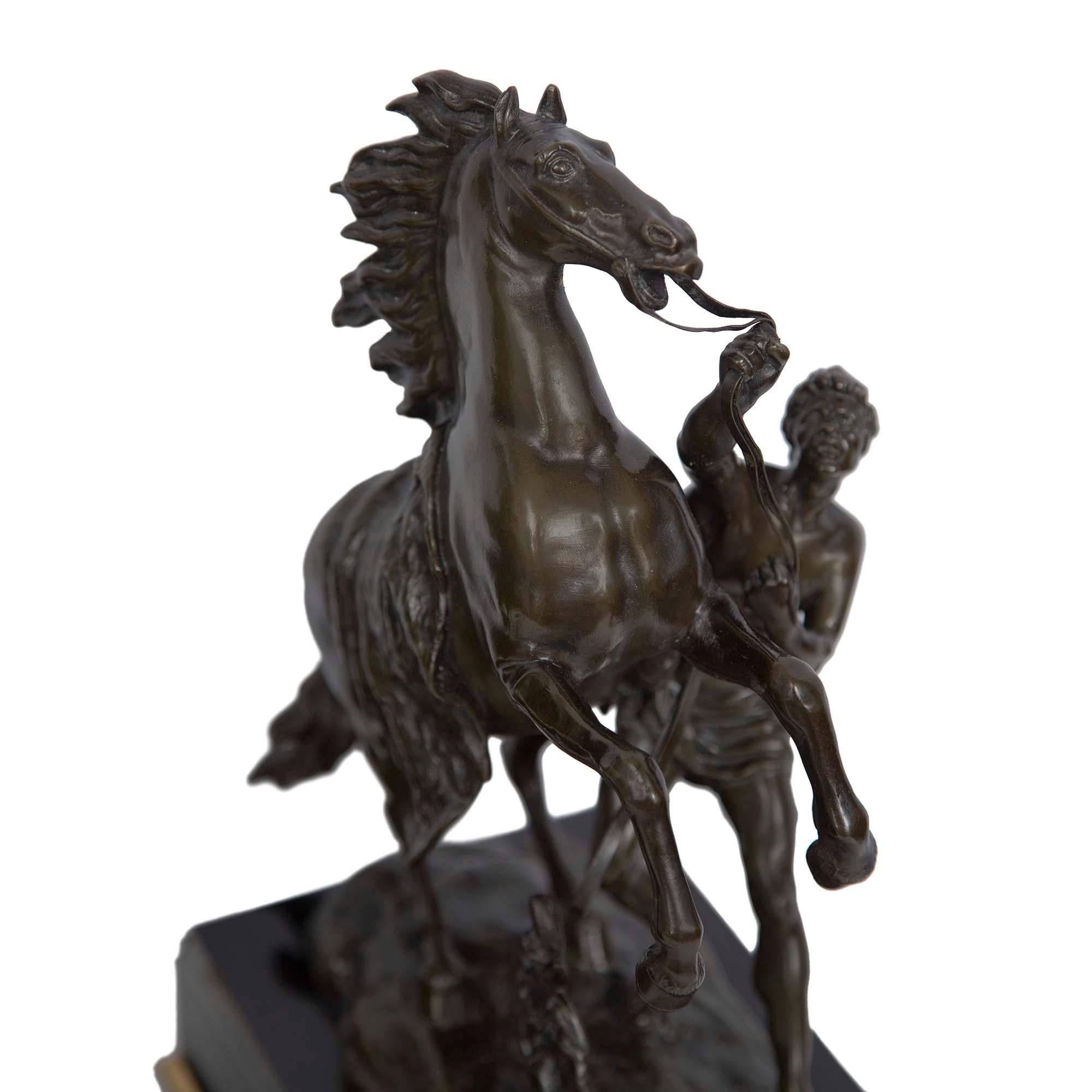 True Pair of French 19th Century Patinated Bronze Marly Horses In Excellent Condition In West Palm Beach, FL