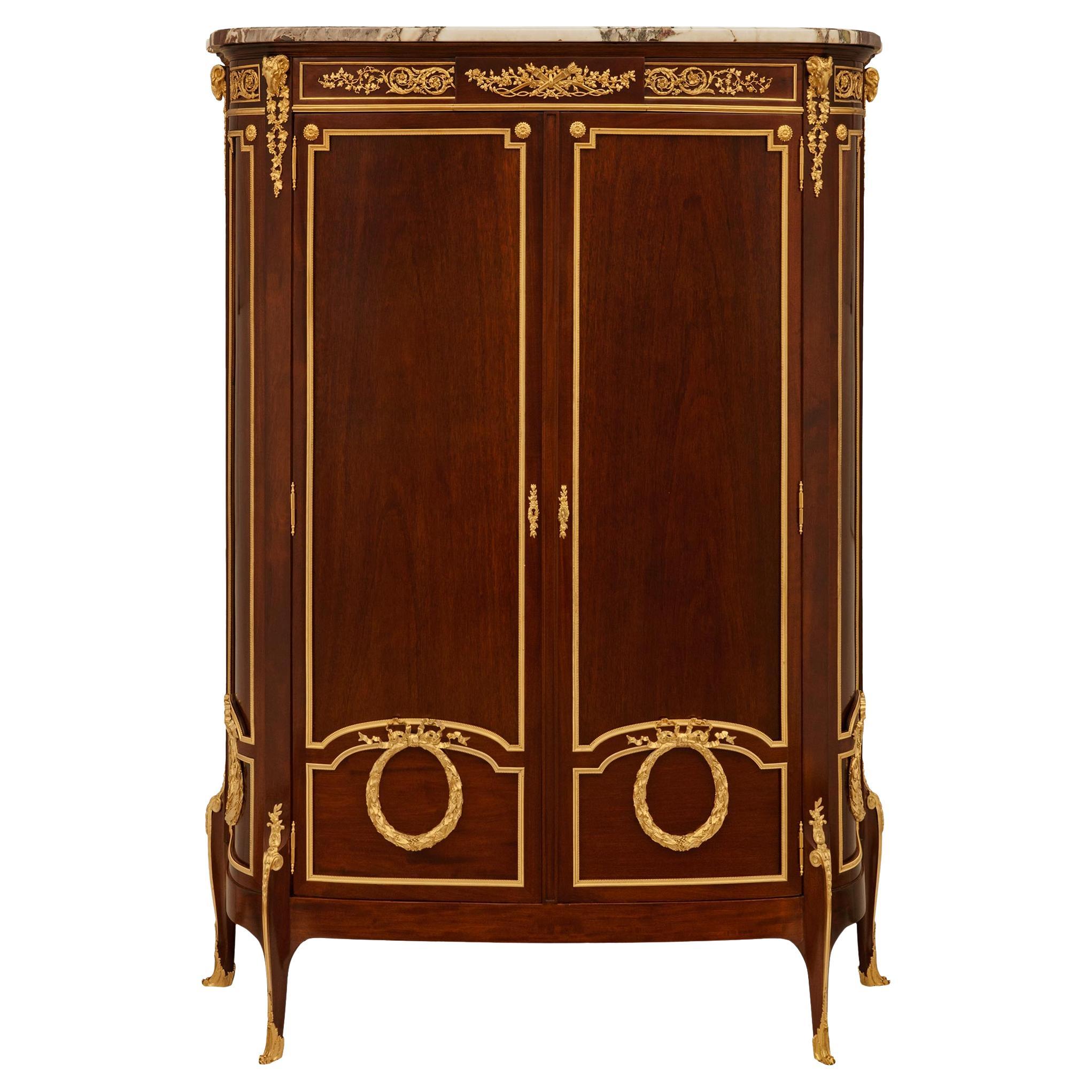French 19th century Transitional st. Mahogany and Ormolu armoire, signed Linke