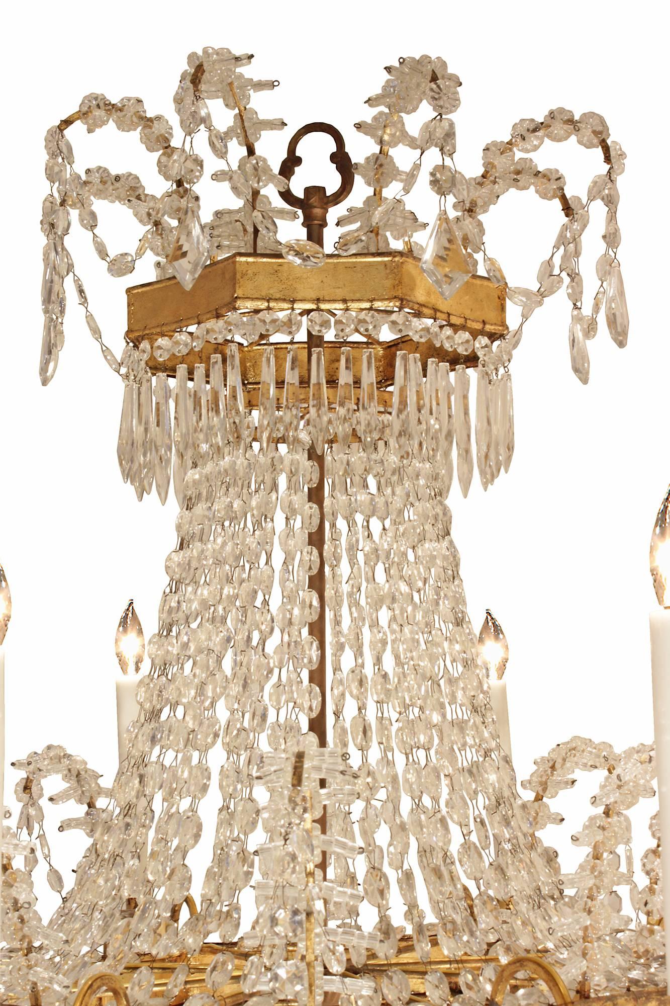 A pair of Italian 19th century gilt metal and crystal eight light chandeliers In Excellent Condition In West Palm Beach, FL