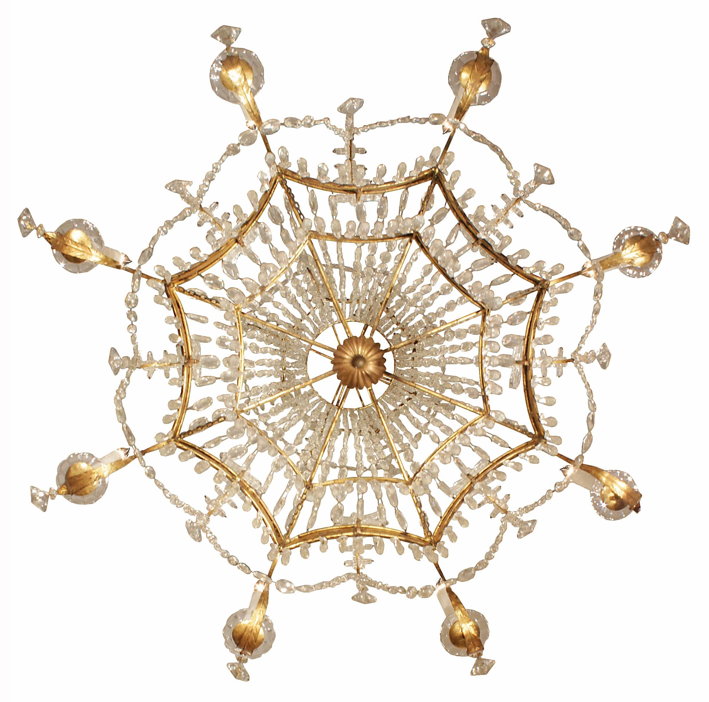 19th Century A pair of Italian 19th century gilt metal and crystal eight light chandeliers