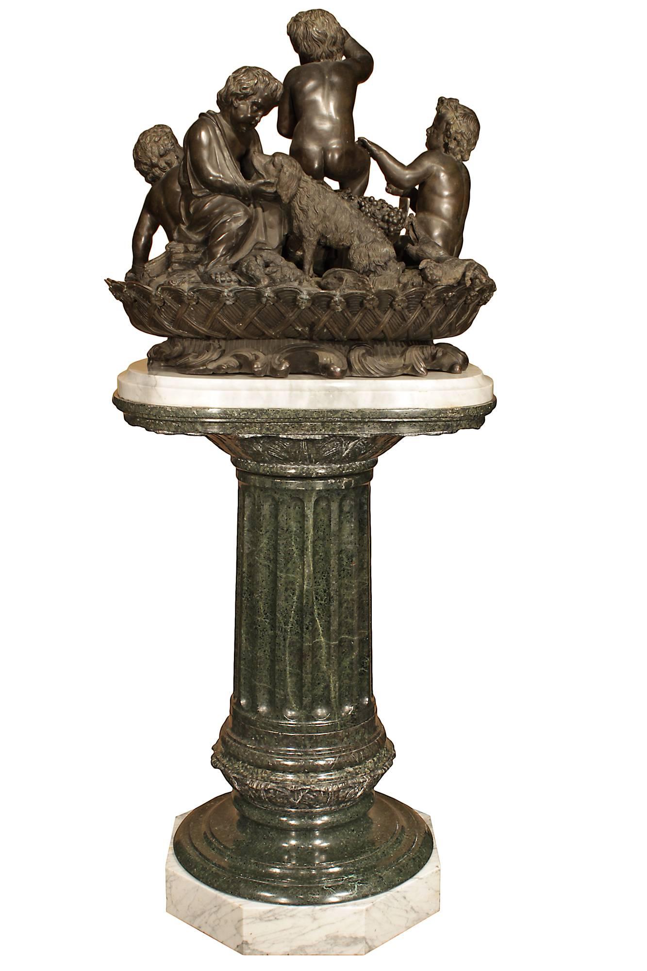 A magnificent French 19th century patinated bronze of The Four Seasons on a marble pedestal. Raised on an octagonal white Carrara marble base, the Vert Antique stepped sole and reeded column has a white Carrara marble-top. The very impressive and