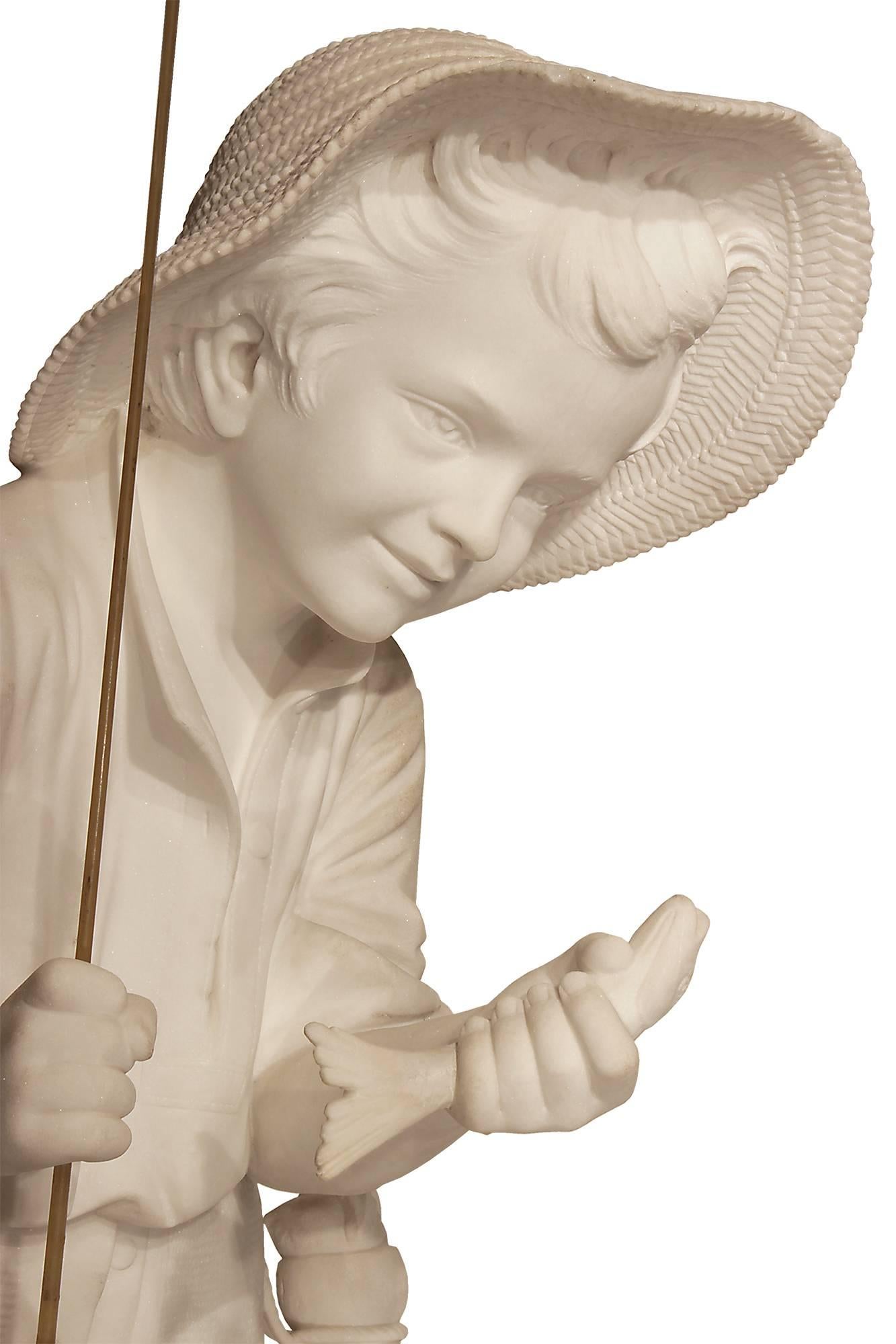 An extremely high quality Italian 19th century Neapolitan white Carrara marble young fisher boy, signed P Bazzanti, Florence 1888. The young boy, carved out of a solid piece of white Carrara marble, is raised on a finely sculpted rock at the river's