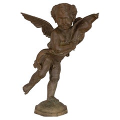 French 19th Century Cast Iron Fountain Of A Young Boy Holding A Dolphin