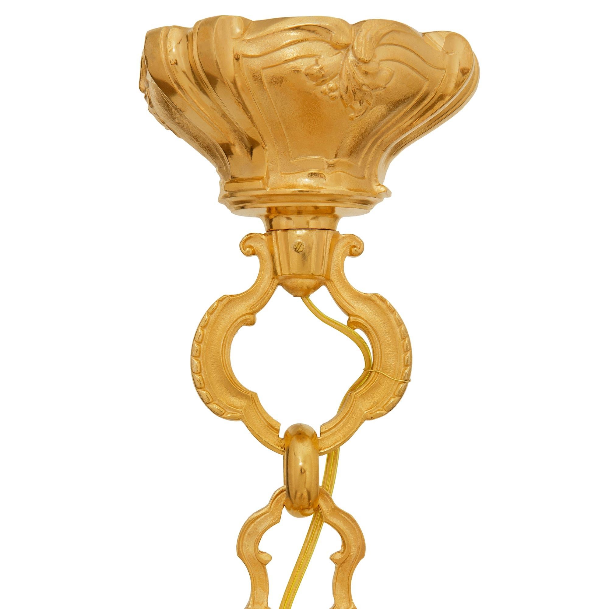 French late 19th century Louis XV/XVI st. Ormolu chandelier In Good Condition For Sale In West Palm Beach, FL