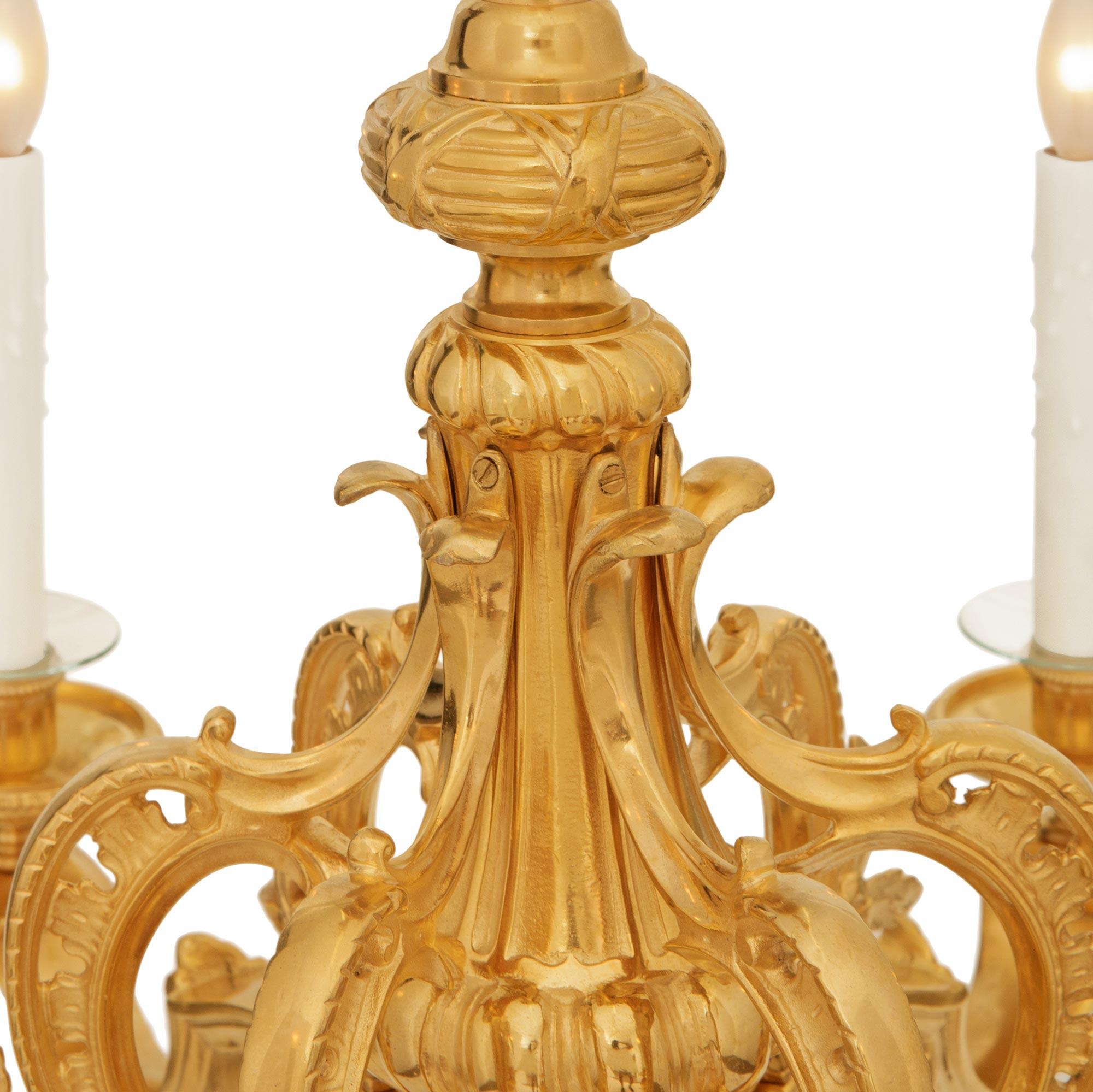 19th Century French late 19th century Louis XV/XVI st. Ormolu chandelier For Sale