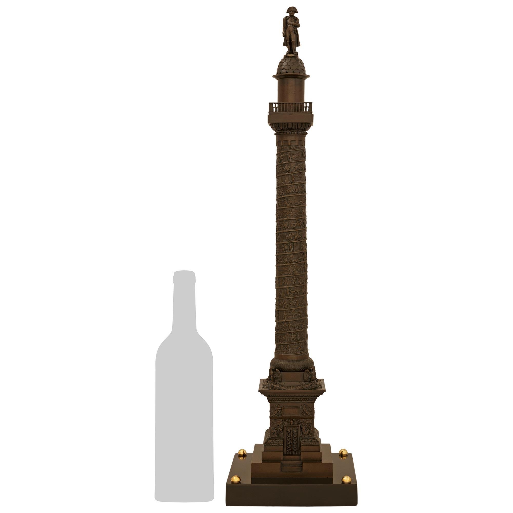 A large scale and wonderfully decorative Italian 19th century Grand Tour Period patinated Bronze, Black Belgian marble and Ormolu Vendôme Column. This impressive Bronze statue is raised on a square Black Belgian marble base with half round Ormolu