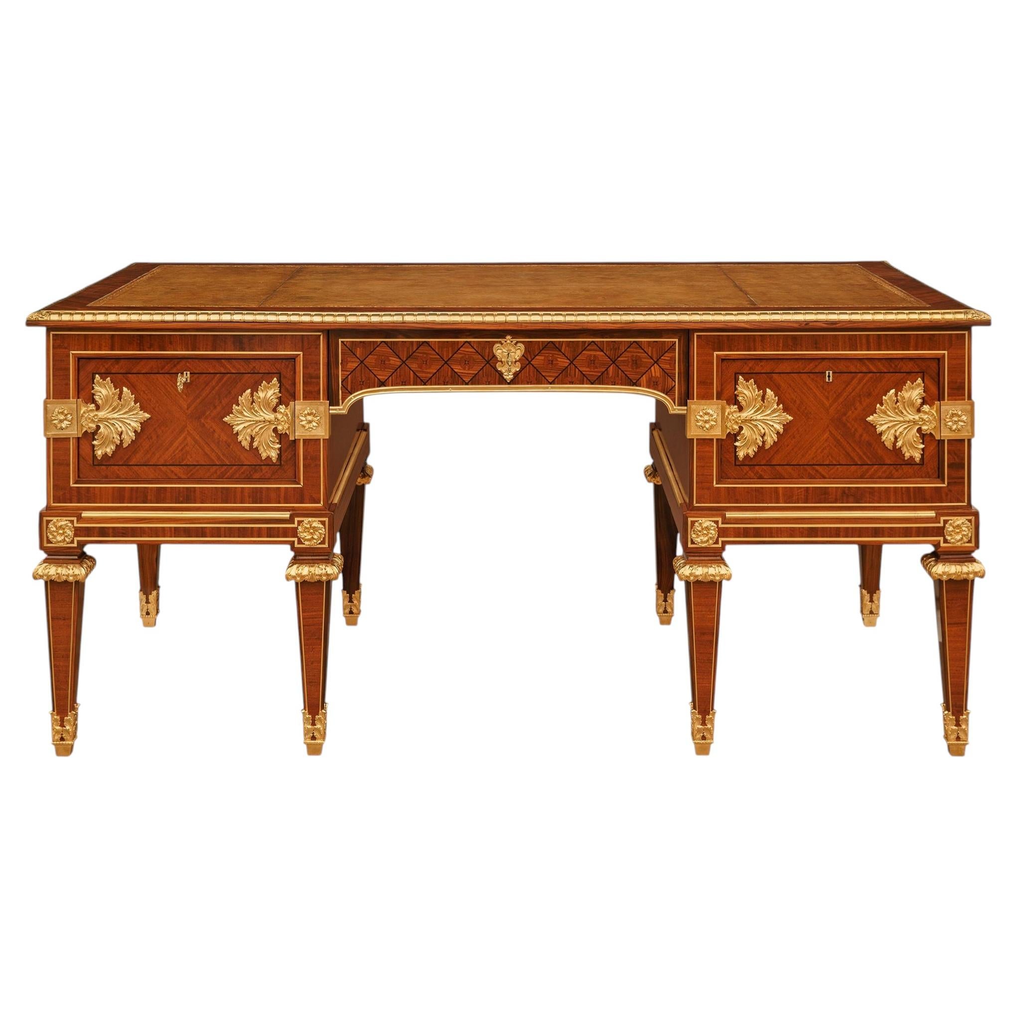 French 19th century Louis XVI st. Tulipwood, Kingwood, Ebony and Ormolu Desk