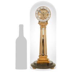 Orologio scheletrato scozzese di inizio secolo in bronzo dorato, marmo e vetro