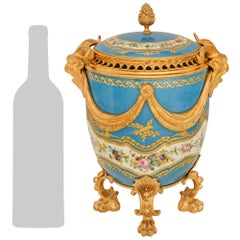 French 19th century Louis XVI st. Porcelain and Ormolu urn, signed Sévres
