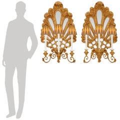 pair of Italian 19th century Baroque st. Giltwood mirrored sconces