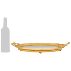 Centro de mesa o bandeja francesa del siglo XIX, de estilo neoclásico, con detalles en bronce dorado y espejo