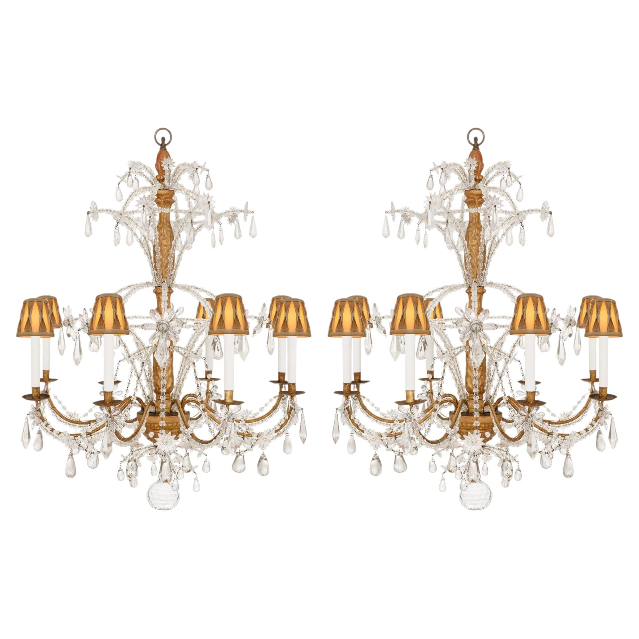 pair of Italian 18th century Giltwood, Gilt Iron, Crystal and Glass chandeliers For Sale