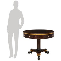 Italian 19th century Mahogany, ebonized Fruitwood, and Giltwood center table