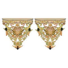 Pair of Italian 19th century Baroque st. glazed patinated wood wall brackets
