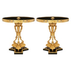pair of French 19th century Louis XVI st. Giltwood, Ormolu and Glass side tables