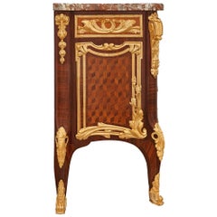 French Transitional st. Tulipwood, ormolu and marble commode by Linke and Bieder