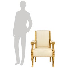 paire de fauteuils français en bois doré datant du début du XIXe siècle, de l'époque de la Restauration