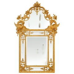 Miroir français en bois doré datant du début du XVIIIe siècle, de l'époque Régence