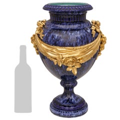 French 19th century Louis XVI st. Glazed Porcelain and Ormolu vase/urn