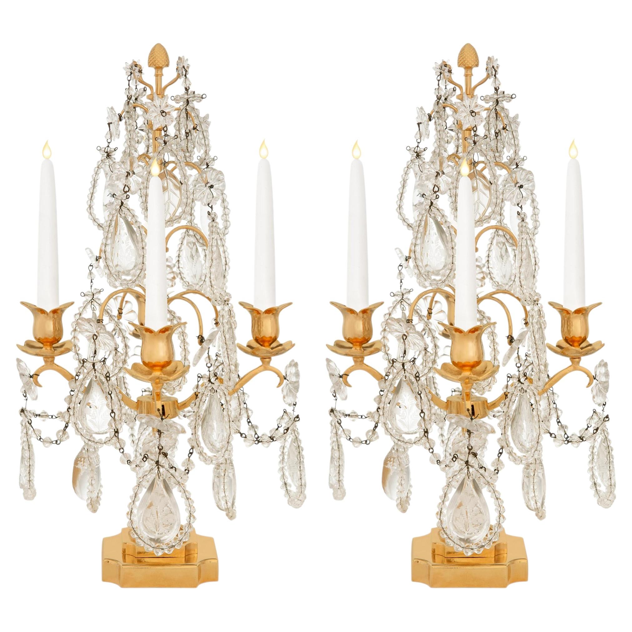 pair of French 19th century Louis XVI st. Ormolu and Crystal candelabras For Sale