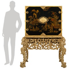 Continental late 17th century Japanese Lacquered cabinet and Italian Mecca stand