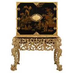 Continental late 17th century Japanese Lacquered cabinet and Italian Mecca stand
