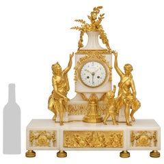 A French Louis XVI st. Carrara marble and Ormolu clock, signed Tiffany & Co
