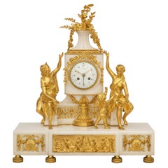 A French Louis XVI st. Carrara marble and Ormolu clock, signed Tiffany & Co