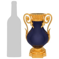 A pair of French 19th century Louis XVI st. Sévres Porcelain and Ormolu Vases