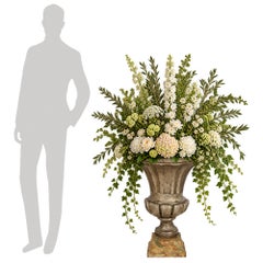 A pair of Italian Neo-Classical st. Mecca and Faux Painted Marble Urns/Planters