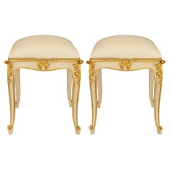 pair of Italian 19th century Louis XV st. patinated and Giltwood benches