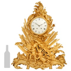 French mid 19th century Louis XV st. Ormolu clock, signed Maline