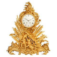 French mid 19th century Louis XV st. Ormolu clock, signed Maline