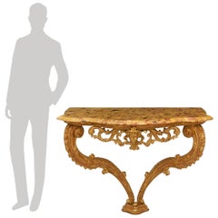 pair of French 18th century Giltwood and Breche D'Alep marble consoles