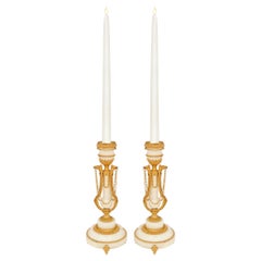 pair of French 19th century Louis XVI st. Carrara marble and Ormolu candlesticks